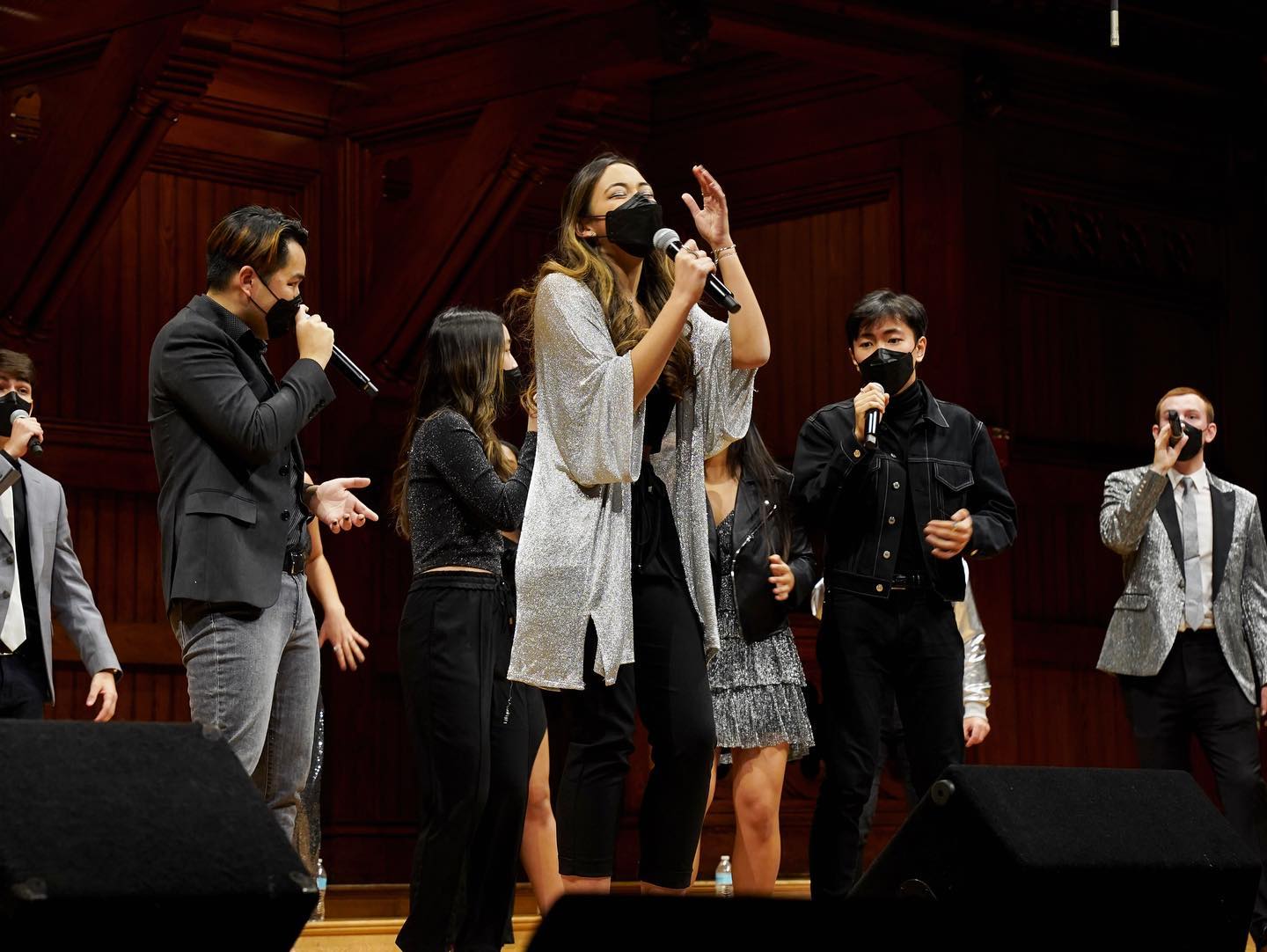 Luisa Shida '25 performs with the Harvard Veritones on Sanders stage.