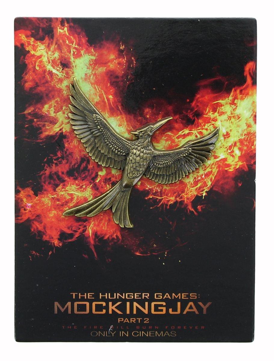 What Does The Mockingjay Pin Symbolize In The Hunger Games The Home