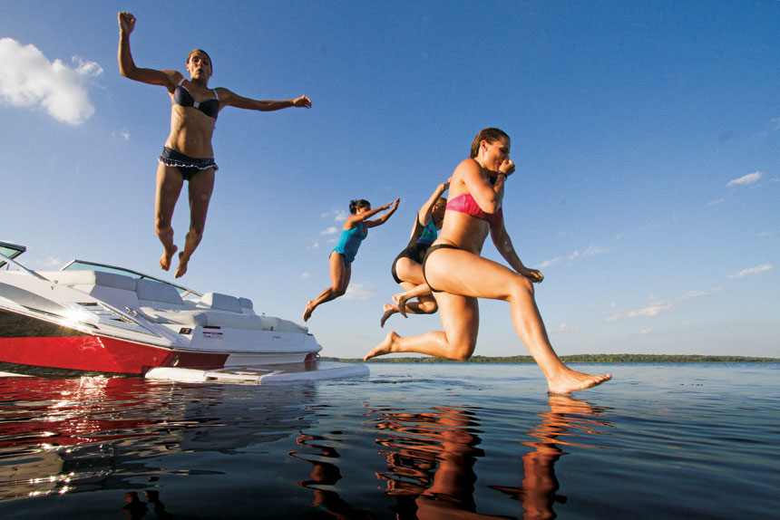 girls-jumping-in-water
