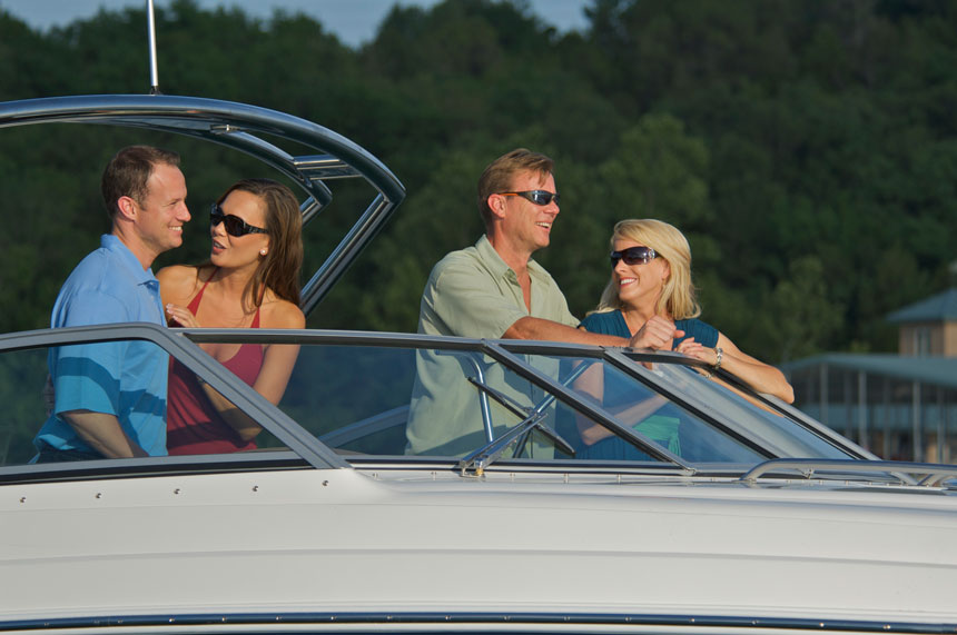two-couples-on-boat-with-sunglasses two-couples-on-boat-with-sunglasses