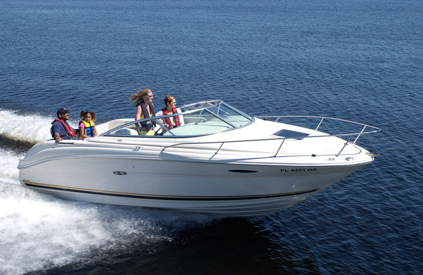 family-in-boat-underway