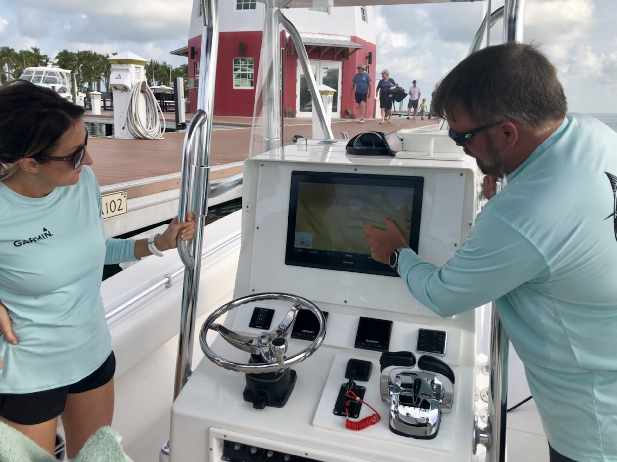 Garmin’s Carly Hysell (left) and Dave Dunn show marine media the company’s newest technology Garmin's Carly Hysell (left) and Dave Dunn show marine media the company's newest technology