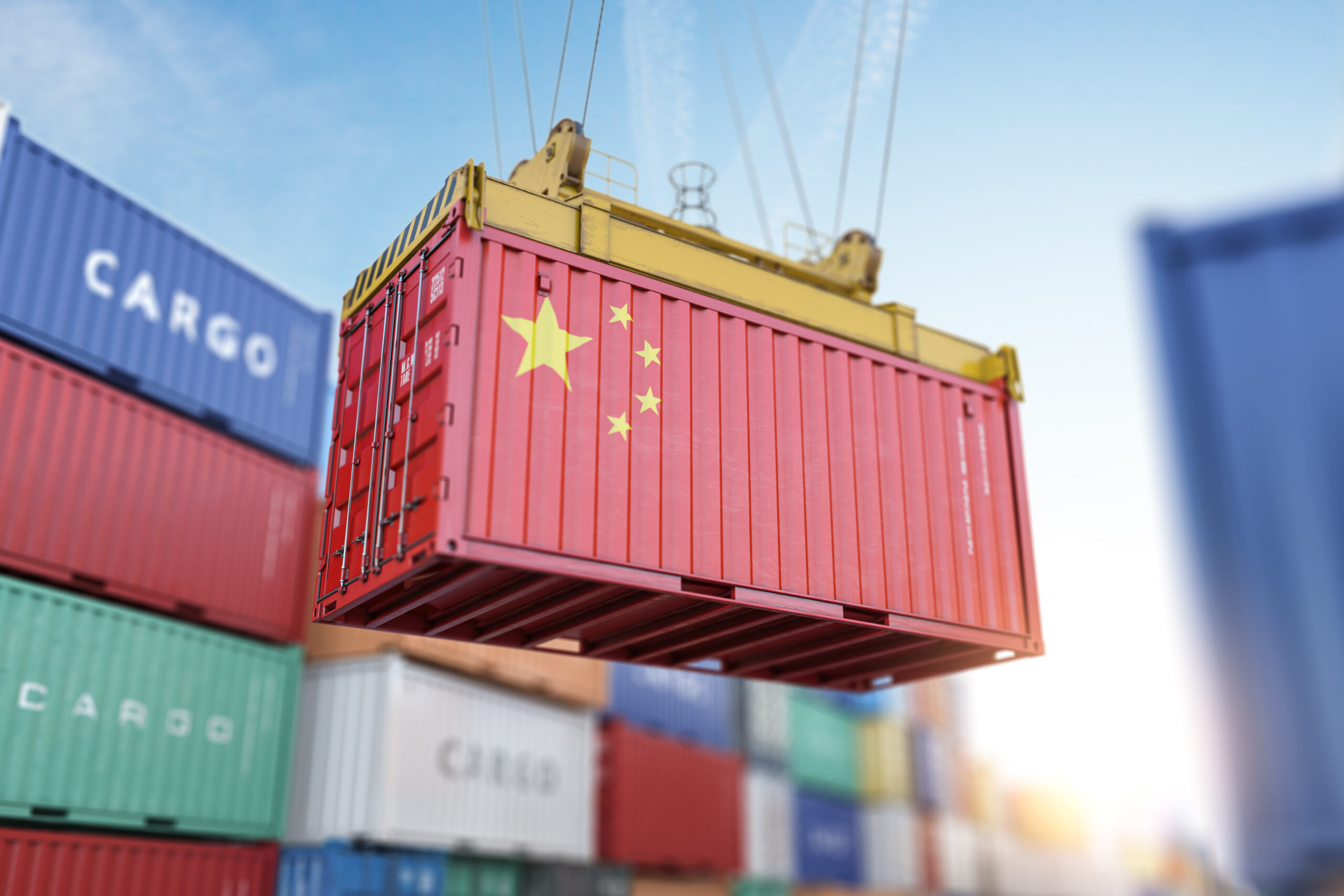 Cargo shipping container with China flag in a port harbor. Production, delivery, shipping and freight transportation of chinese products concept. Cargo shipping container with China flag in a port harbor. Production, delivery, shipping and freight transportation of chinese products concept.