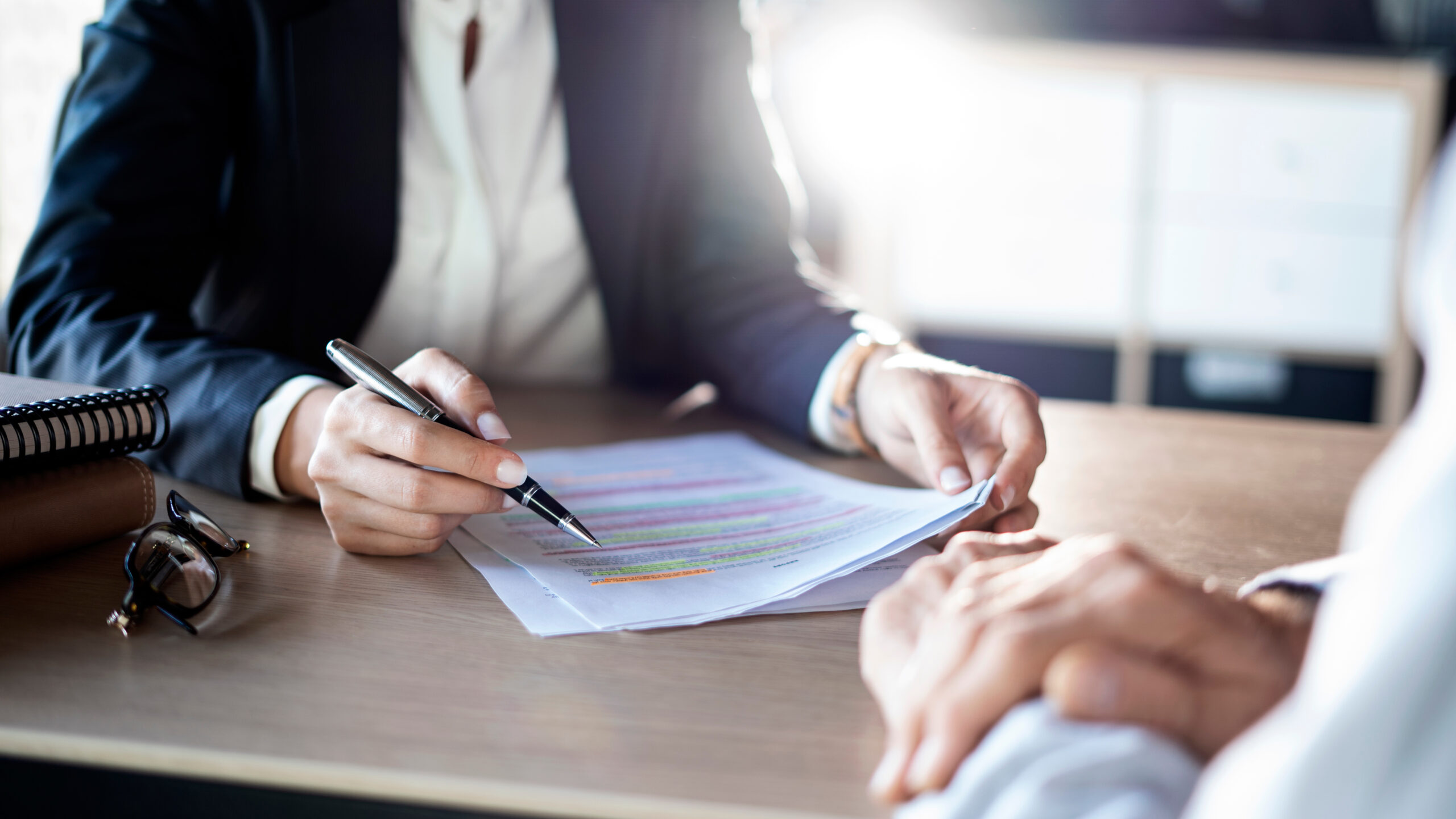 Business people discussion advisor concept Keep a sharp eye out or ways to advance your career when you sign contracts. PHOTO: SEBRA-STOCK.ADOBE.COM