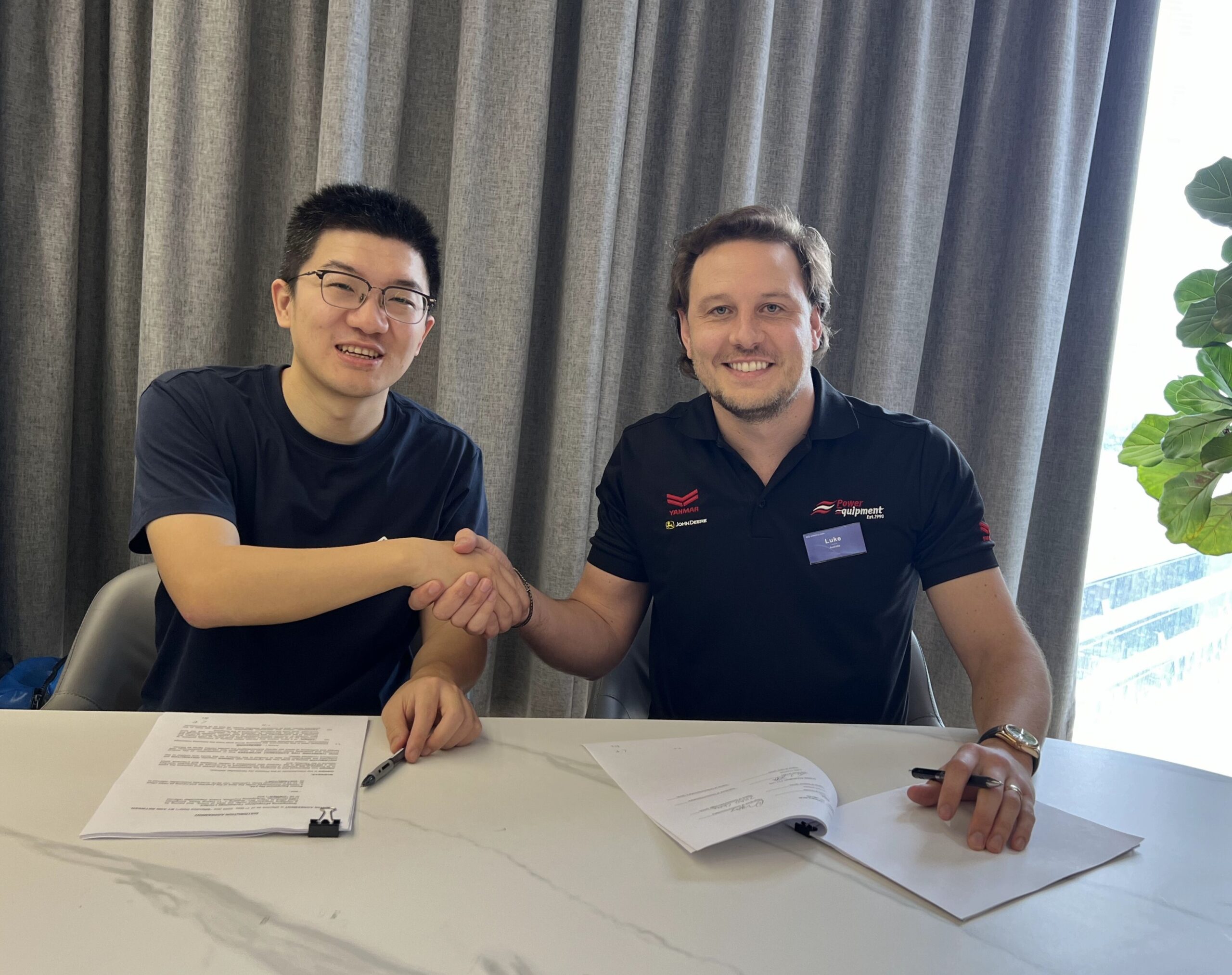 Danny Tao (left) of ePropulsion and Luke Foster of Australia’s Power Equipment. PHOTO COURTESY EPROPULSION