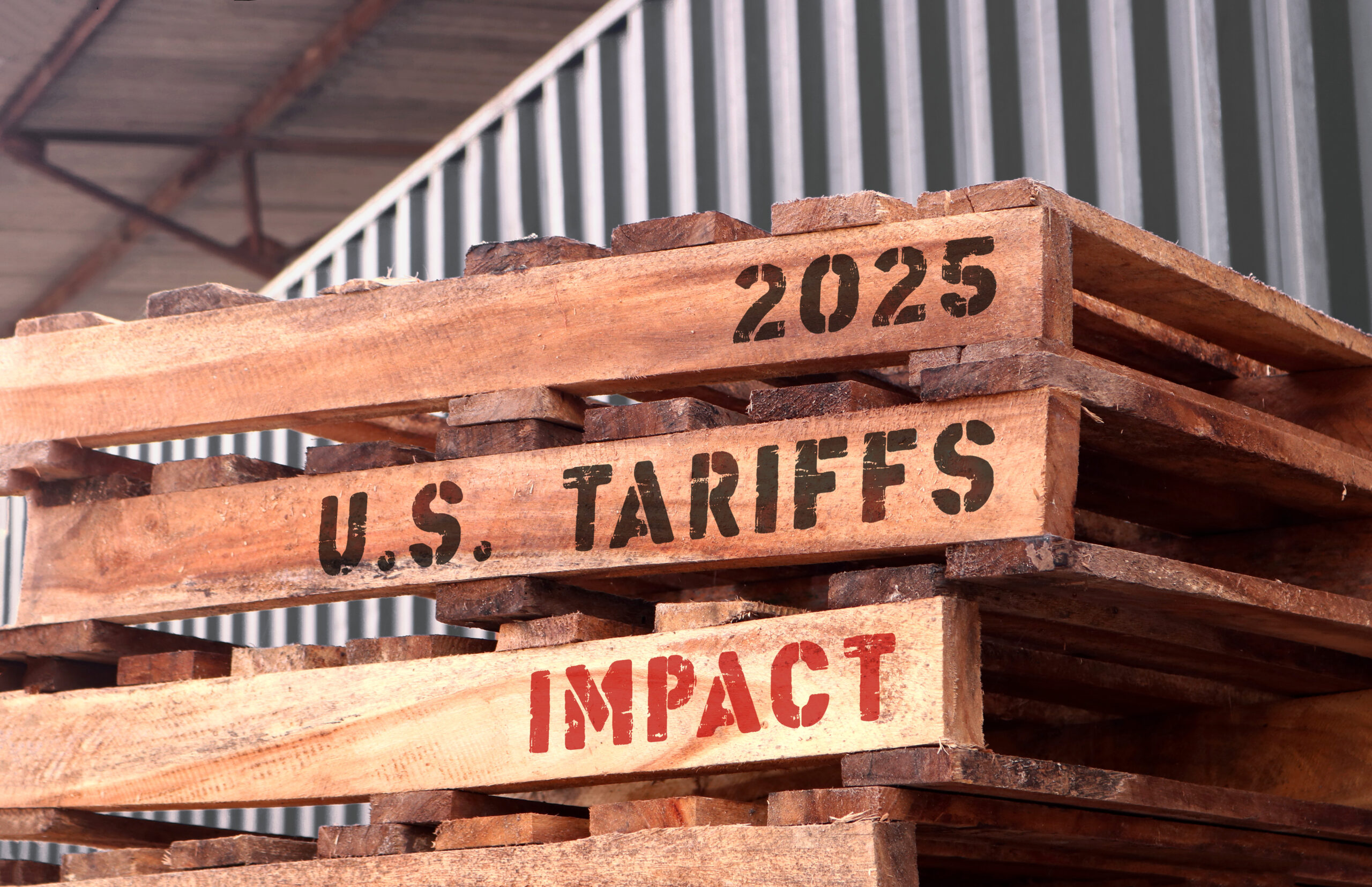 2025 U.S Tariffs impact, text written on piled up pallets. Trade and supply chain concept. FORMASR PHOTOGRAPHY - STOCK.ADOBE.COM PHOTO