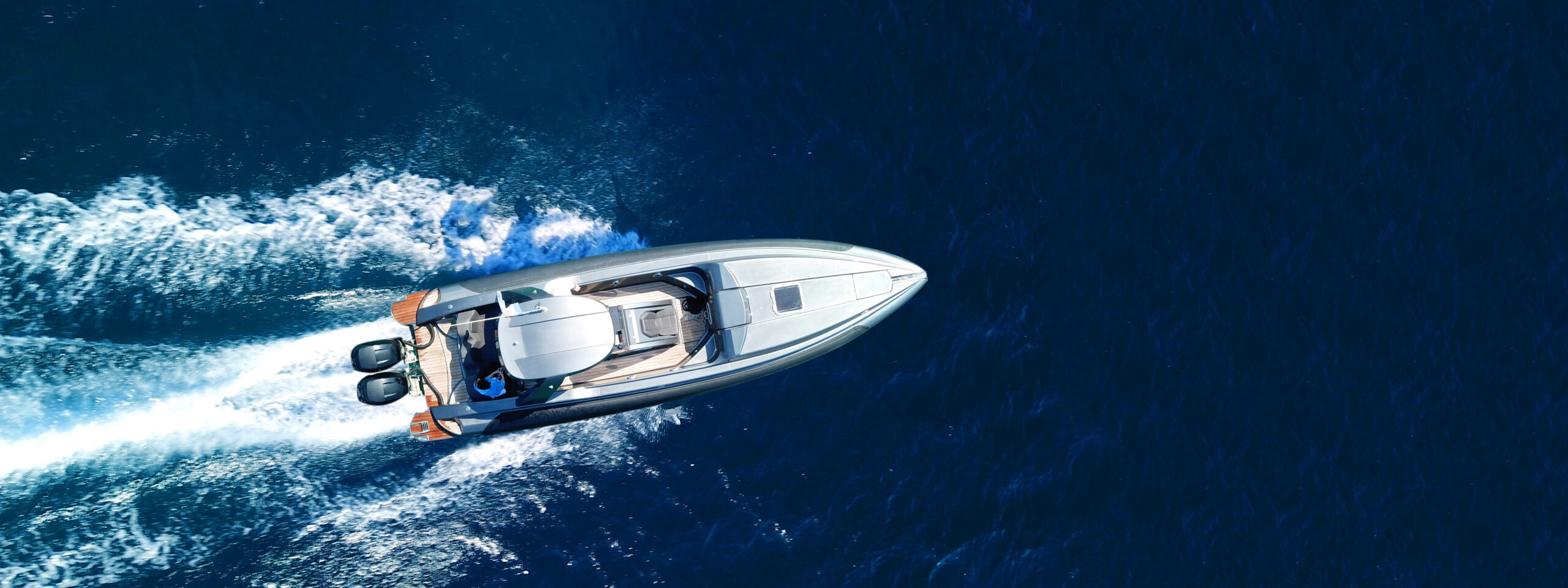 Aerial drone top down ultra wide photo of inflatable speed boat Starting with model year 2026, NMMA Certification will include the new ABYC A-4 Fire Fighting Equipment standard. PHOTO: AERIAL-DRONE - STOCK.ADOBE.COM
