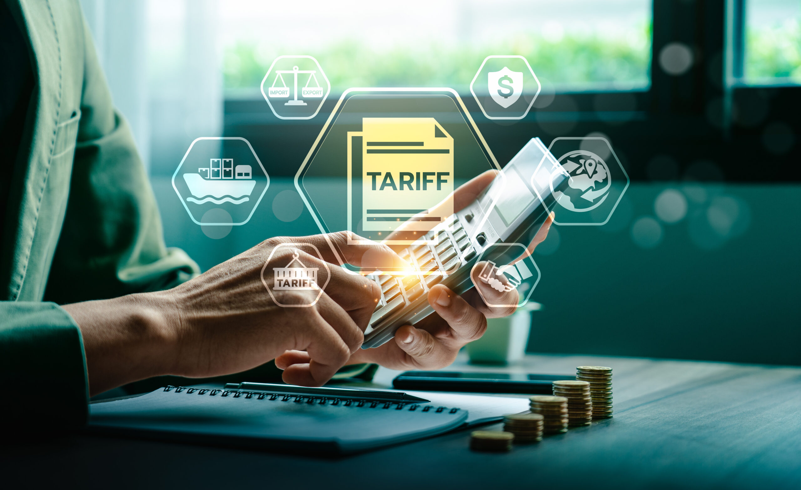 Digital Tariff Management and International Trade Calculation Concept with Businessman Using Calculator for Global Import Export Cost Analysis and Economic Strategy Planning SUTTHIPHONG – STOCK.ADOBE.COM IMAGE
