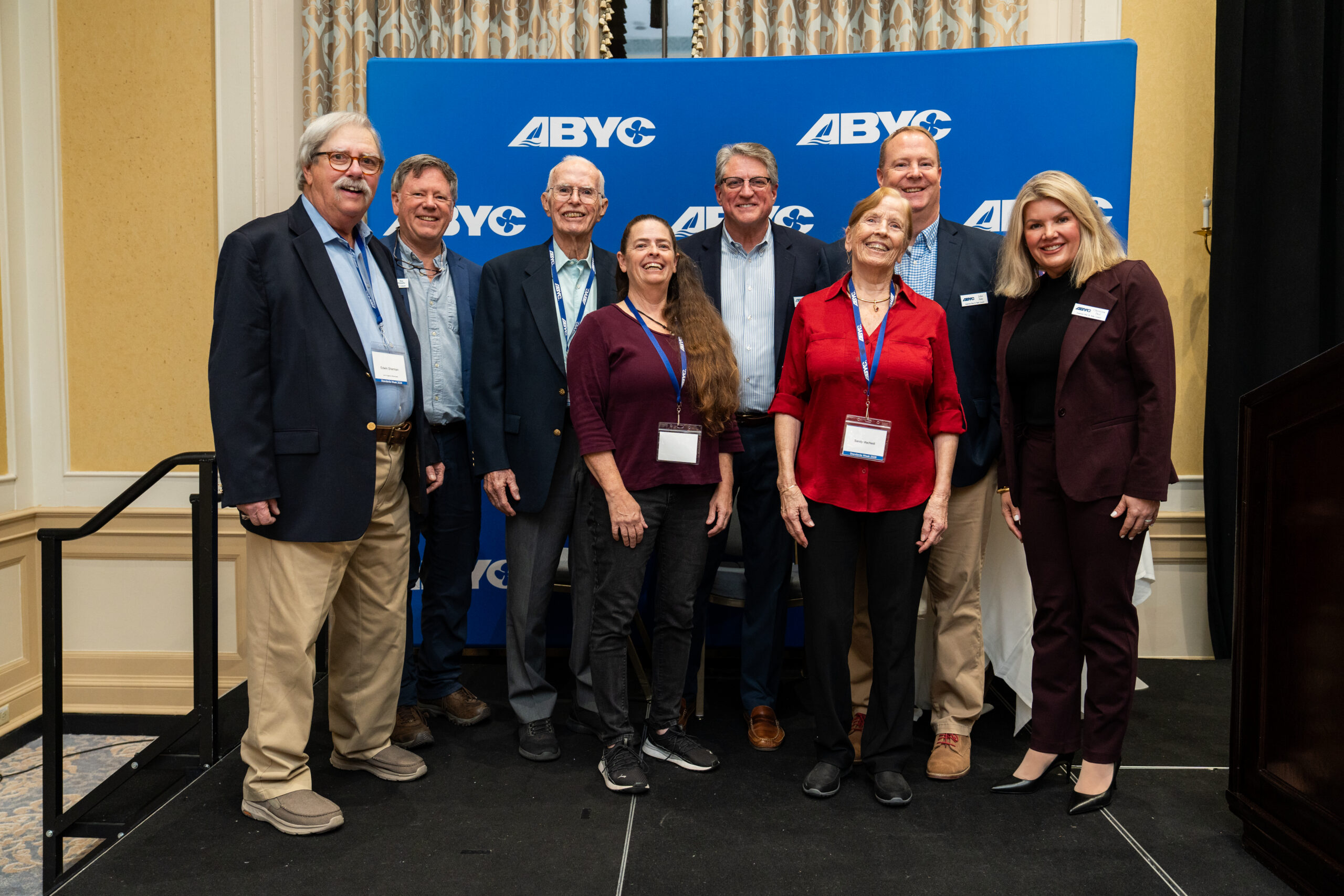 Award winners and presenters (from left): Ed Sherman, Tim Murphy, Bob MacNeill, Kimberly Horn, David Marlow, Sandy MacNeill, John Adey and Christina Paul. PHOTO COURTESY ABYC