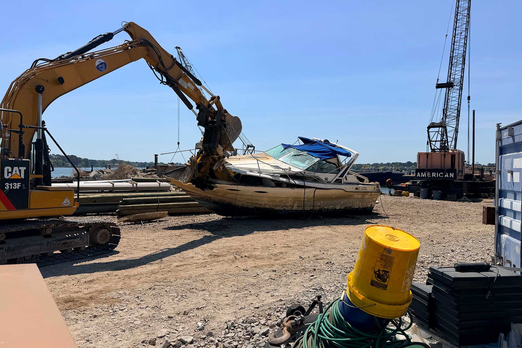 An ADV removed from the Elizabeth River being crushed for disposal. PHOTO COURTESY BOATUS FOUNDATION