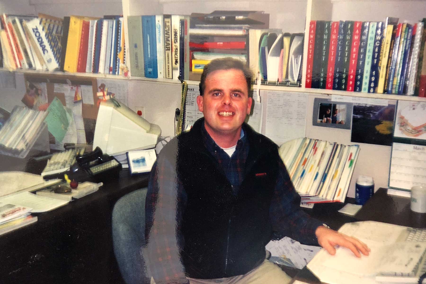 A much younger editor at the Fawcett Boat Supplies wholesale office in 1997. PHOTO COURTESY GARY REICH