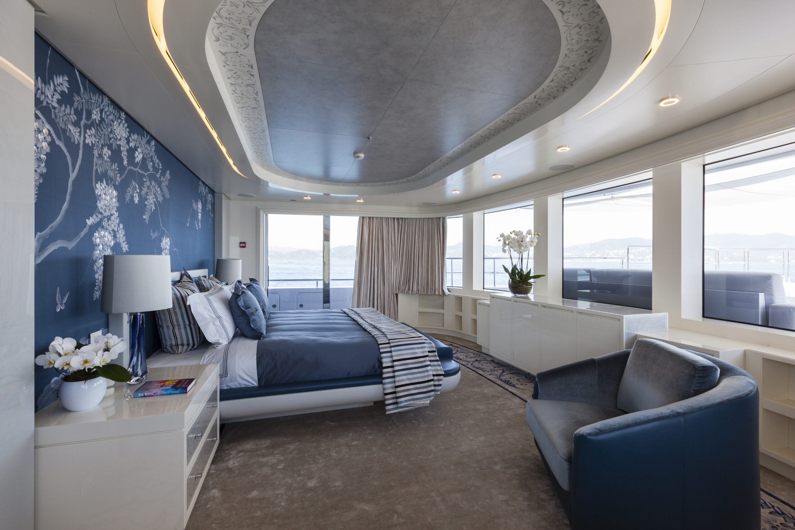 Admiral QUINTA ESSENTIA — VIP stateroom The Admiral E Motion hybrid Quinta Essentia is unlikely to be confused with any other yachts moored along the French and Italian rivieras. Not only does the 180-foot (55-meter) superyacht have eye-catching exterior styling that singles her out from the crowd, but she is truly a standout beneath her striking burgundy and white livery.
