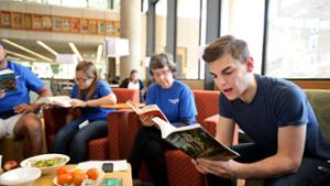 students reading paradise lost