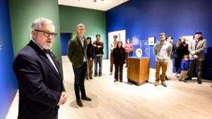 Stephen Harrison, Chief Curator at the Munson Museum of Art, addresses students and visitors at the exhibition opening.