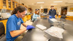 Prof. Ariel Kahrl, Madison Kob &rsquo;28, and Austin Tubia &rsquo;27 prepare samples.