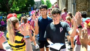 New students, returning students, family, friends faculty and staff, make their way through the gauntlet
