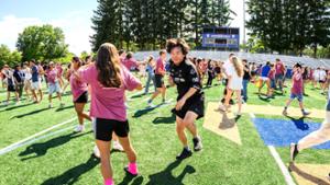 New students join in on fun and games during the opening ceremony on Steuben Field