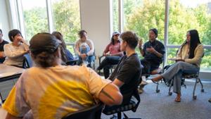 Students discuss the phenomenon of "brain rot" during the inaugural Public Philosophy lunch.