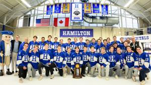 The Men's Hockey Team at the championship banner unveiling.