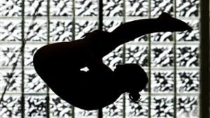Diver Lucy Meola &rsquo;26 in the 1 meter diving event vs. RIT in Bristol Pool in January.