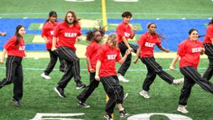 Hamilton College HEAT performs during halftime