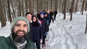 Snowshoeing for a biodiversity field lab in Rogers Glen. Photo: Assistant Professor of Biology Peter Guiden