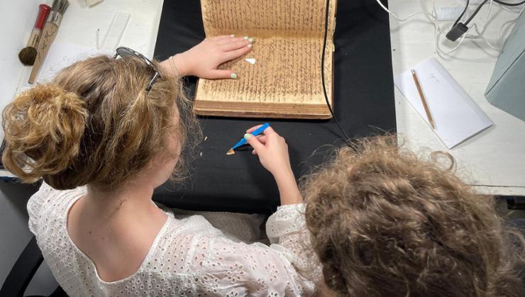 Elizabeth Atherton '22 and Emma Tomlins '23 at work.