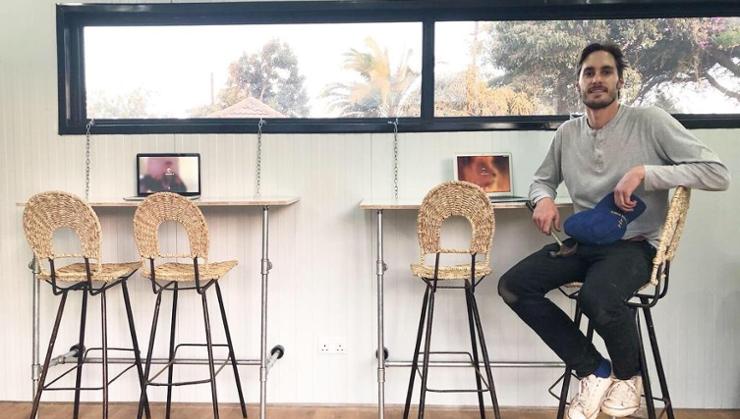 Peter Kazickas ’15 in one of his shipping-container classrooms.