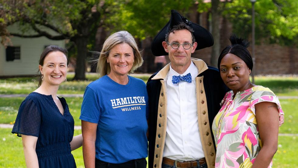 From left: Director of Digital Initiatives, Scholarship, and Collaboration Lisa McFall, Student Health Services Coordinator Stacie Wallace, President Steven Tepper, and Director of International Student Services Omobonike Odegbami. Missing from photo: Carpenter Stan Segur (Facilities Management ).
