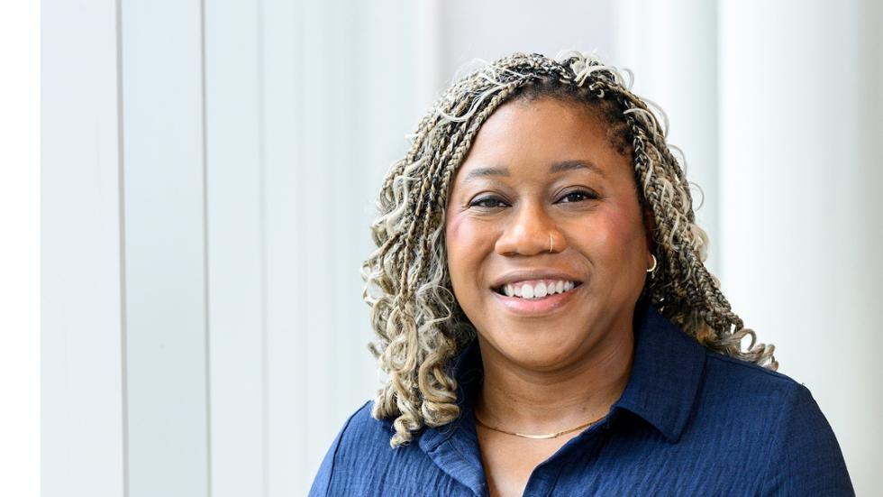 Tara M. Holman