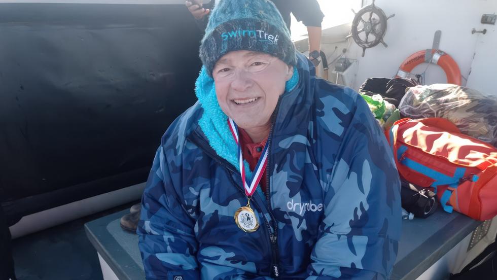 Victor Maldonado ’86 displaying the flag of his native Puerto Rico after conquering the English Channel.