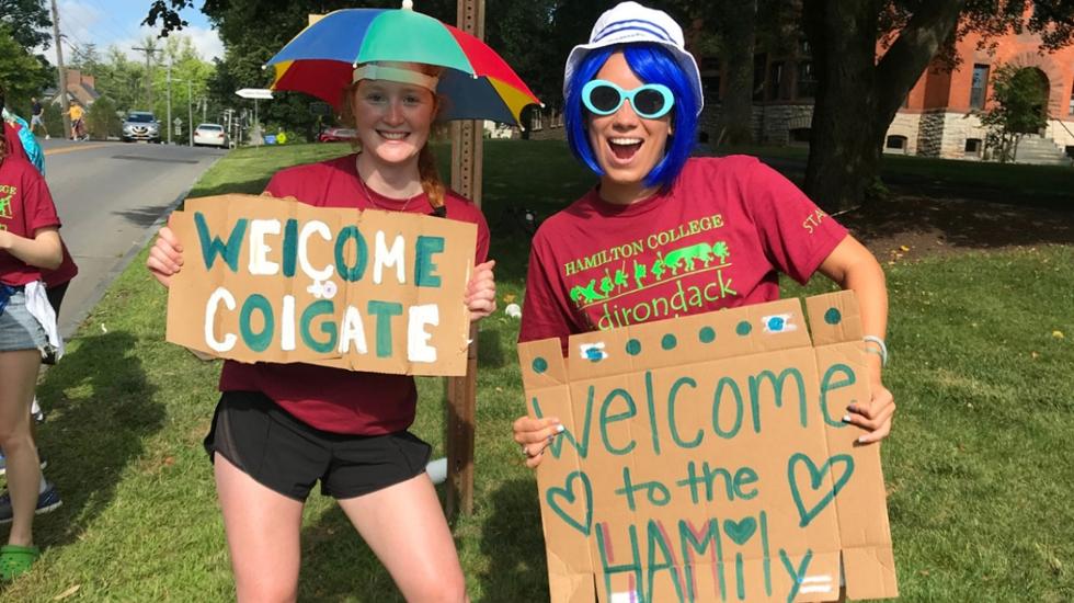 Julia Martin ’21, right, welcomes students to campus during Orientation 2019