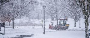 Facilities Management clearing snow on a winter day.