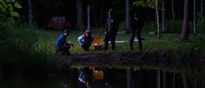 Prof. Ariel Kahrl and her student research team catch frogs at night.