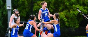 Hamilton field hockey defender Isabelle Nahon ‘27 (15) celebrates her first career goal in a game against #1 Middlebury at Goodfriend Field on Sept. 6.