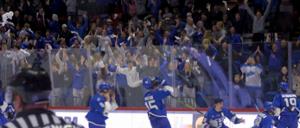 video clip of men's hockey team and fans celebrating historic win