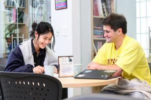 Two students work together at the Language Center.