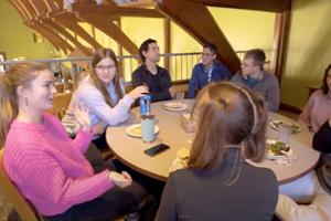 Students chat over lunch at the Spanish language table.