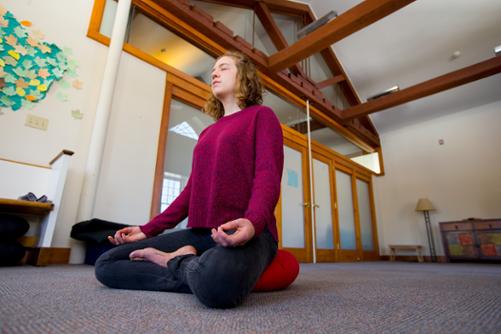 A student uses in the Chapel's Meditation Room