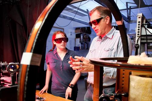 student and professor in chemical physics lab