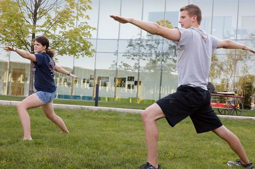 students doing yoga