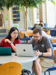 students and faculty in the Taylor Science Center Wellin Atrium
