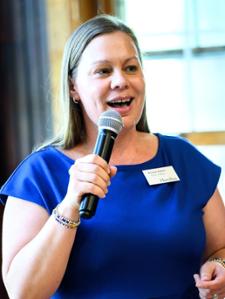 New Director of Athletics Kristine R. Fowler speaks to alumni in the Little Pub