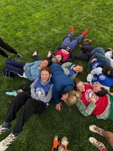 The Hamilton College Ultimate Frisbee Team relaxes after practice.