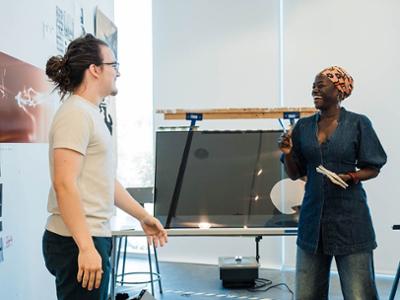Art Student and Artist discuss work