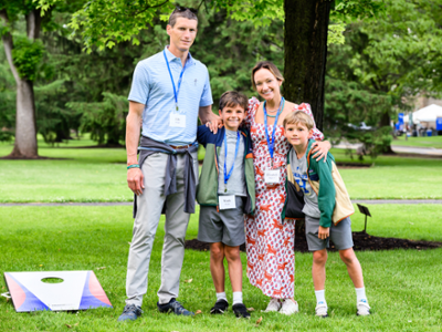 Elizabeth Dolan Wright '05, her husband, and two sons pose at Reunions.