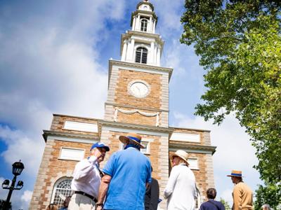 alumni gather outside the chapel