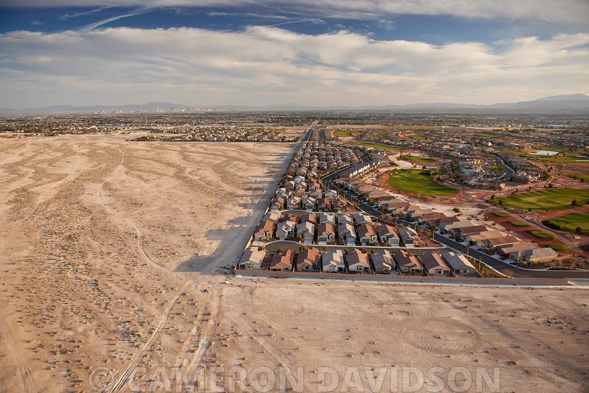 Aerial Stock Aerial photograph of North Las Vegas suburbs abutting