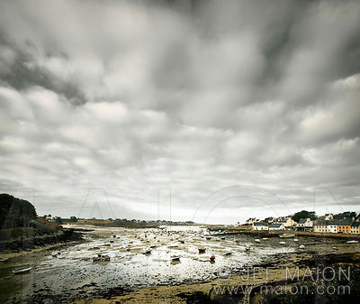 Low tide in village harbour