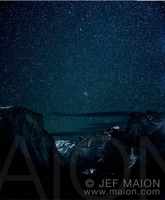 Mountain valley by night and stars